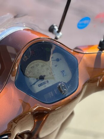  Vespa Snorscooter LX 4T - BMW Chestnut Bronze Metallic
